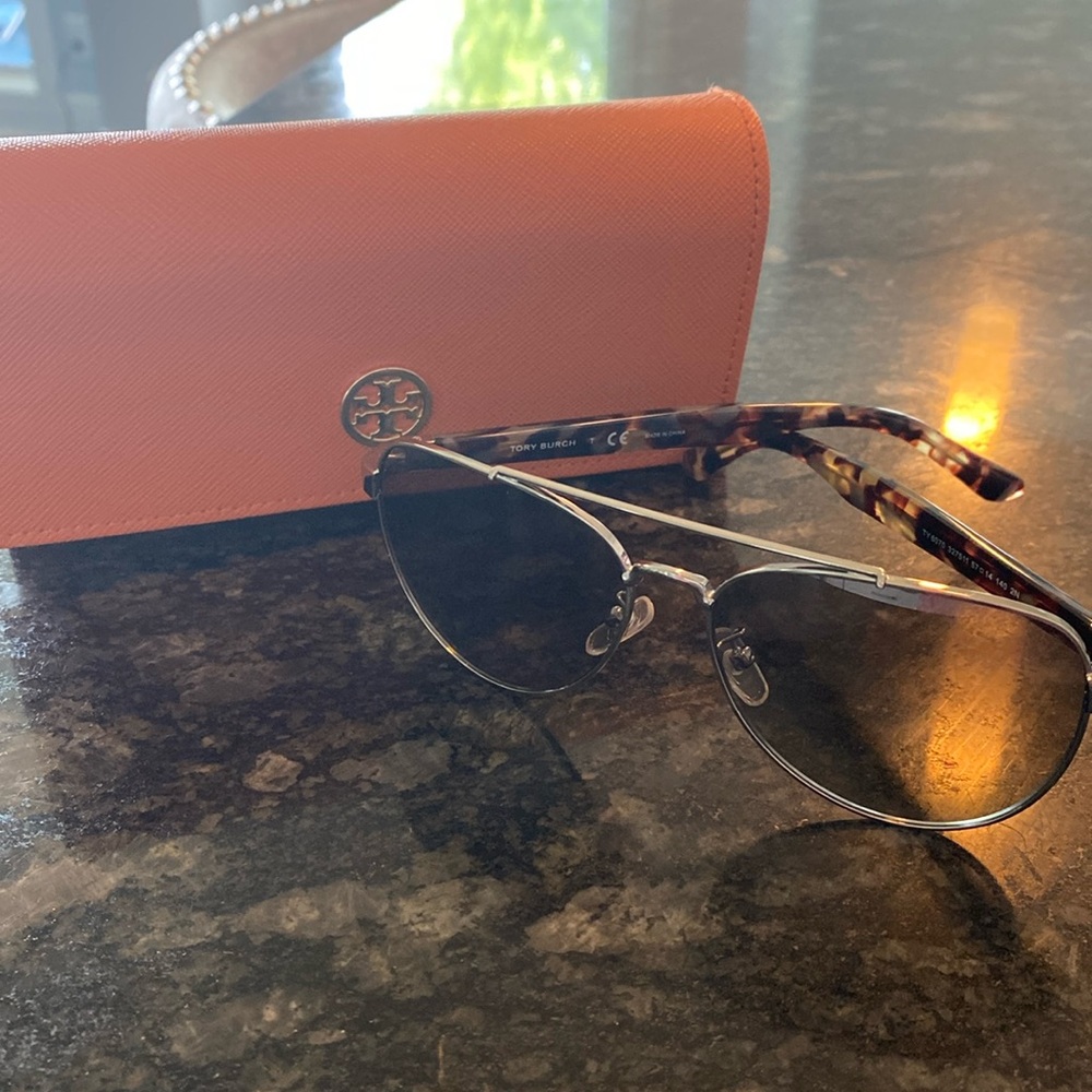 Tory Burch sunglasses with case.